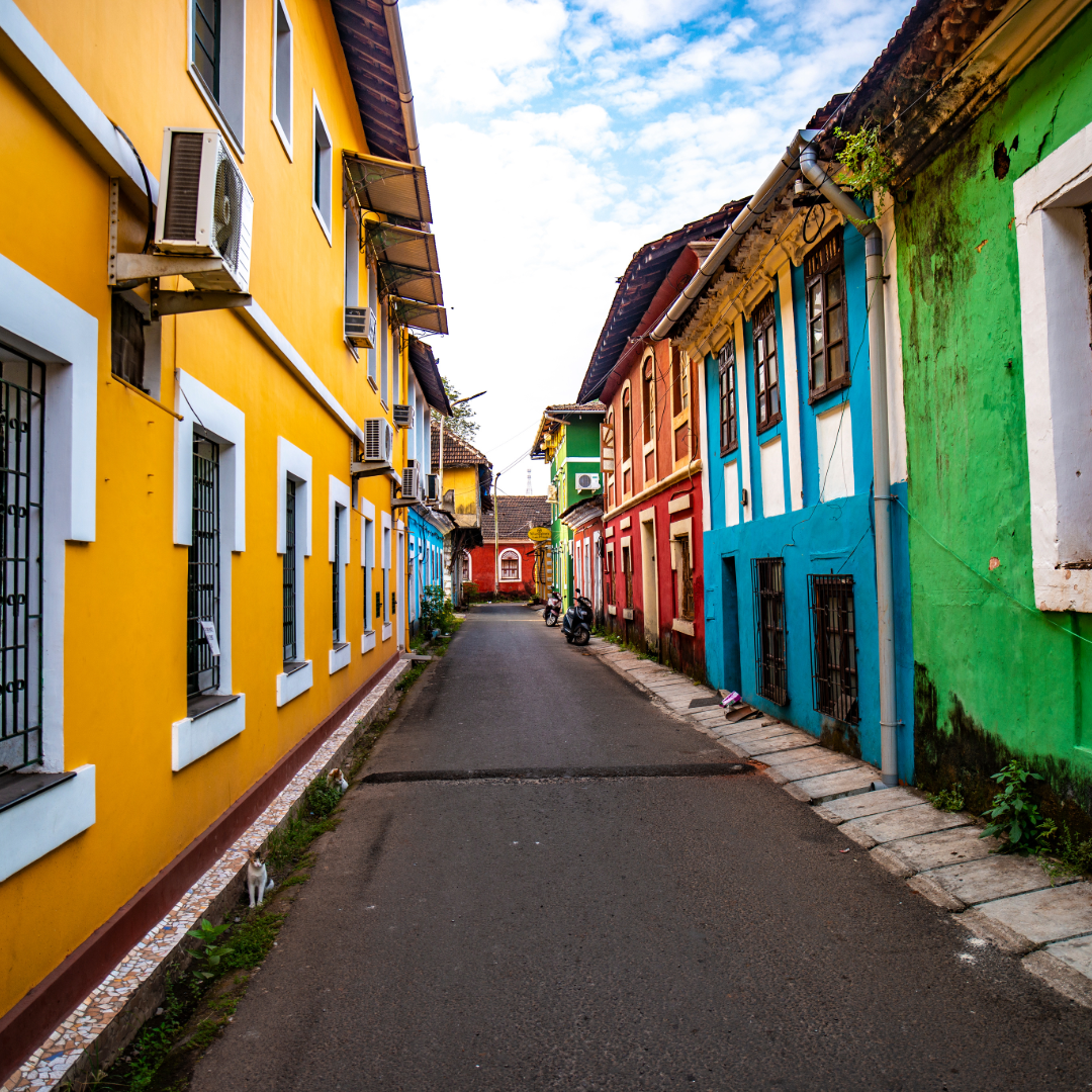 Colourful Portuguese street in Goa with bright facades